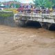 Debit Sungai Badeng di Dam Garit yang mengalami peningkatan setelah hujan deras.