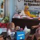"Sebuah gambar yang menunjukkan suasana Posyandu Gelatik di Taman Baca Masyarakat Al Djawahir Gambiran dengan orang dewasa dan anak-anak. "