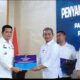 Pj Bupati Deli Serdang, Ir. Wiriya Alrahman MM, menyerahkan Daftar Himpunan Ketetapan Pembayaran (DHKP)