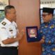 Direktur Data dan Informasi Deputi Bidang Hukum dan Kerja Sama (Inhuker) Bakamla RI, Laksamana TNI Sigit Winarko,dengan Wakil Bupati Banyuwangi Mujiono