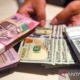Rupiah Melemah di Batas Rp17.353 per Dolar, Tekanan Global dan Harga Minyak Memicu Ketidakstabilan Nilai Tukar