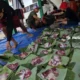 Warga Rusunawa KS Tubun Sambut Antusias Pembagian Daging Kurban