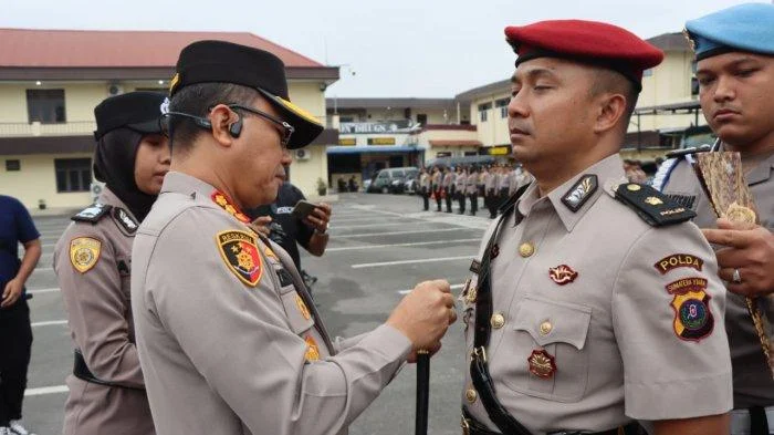 RUU Polri Disahkan: Wamenkum Ungkap Alasan Batas Usia Pensiun 60 Tahun untuk Perwira