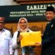 Bupati Banyuwangi Ipuk Fiestiandani menyerahkan dokumen nota pengantar KUA-PPAS Tahun Anggaran 2027 kepada Wakil Ketua DPRD Banyuwangi Michael Edy Hariyanto, SH, MH, didampingi Wakil Bupati Ir. H. Mujiono, M.Si dalam rapat paripurna DPRD Banyuwangi.