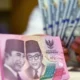 Rupiah Menguat Tipis ke Rp18.065, Tapi Ancaman Pelemahan Masih Membayangi